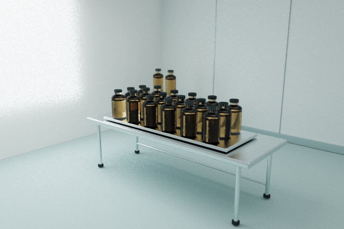 Rows of plain amber glass bottles with dark caps on a stainless tray