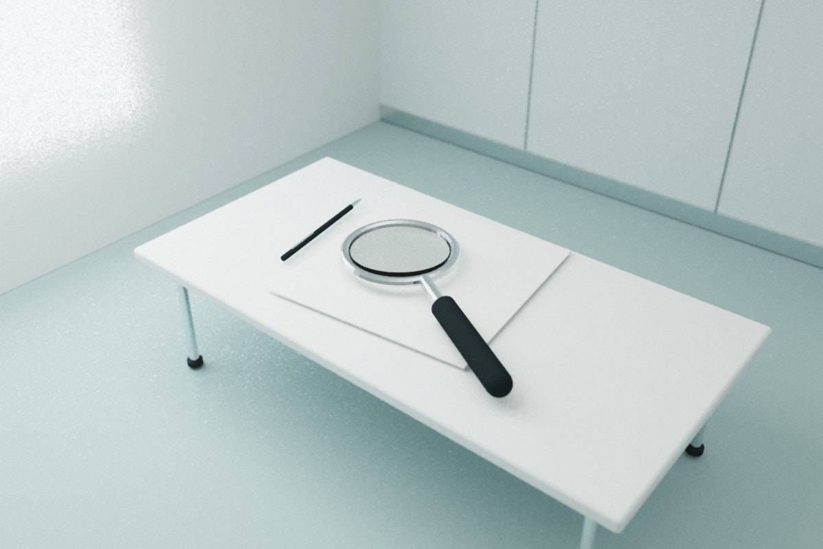 Magnifying glass and pen resting over blank paper on a table